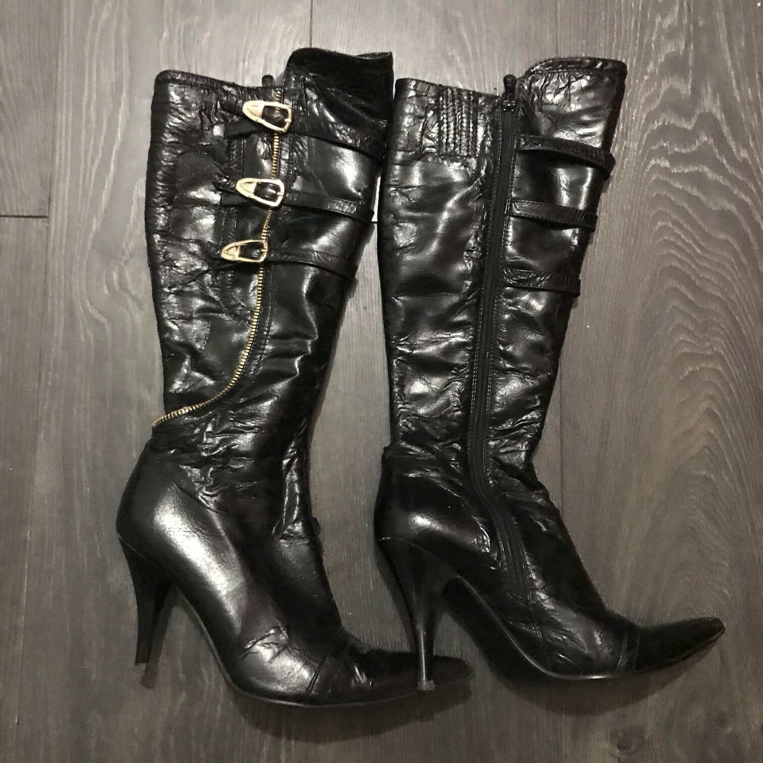 Used boots - Black shiny knee high boots with buckles Used boots - Black shiny knee high boots with buckles