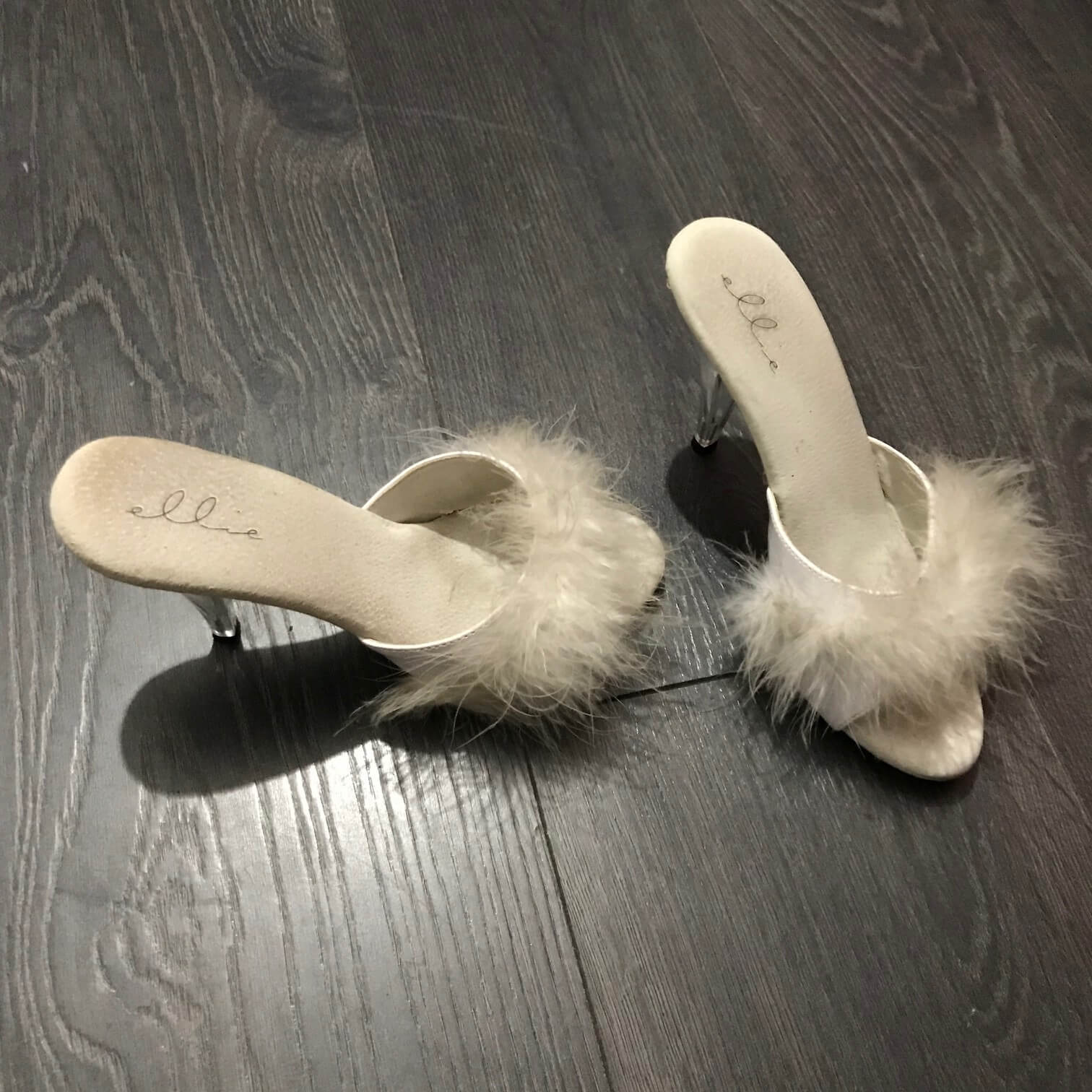 White fluffy mule with clear heels White fluffy mule with clear heels