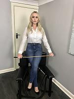 Miss Jessica in jeans and white blouse