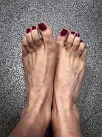Miss Jessica Wood feet red toenails