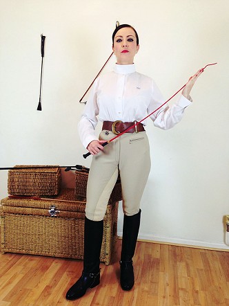 Miss Jessica Wood in jodhpurs with dressage whip